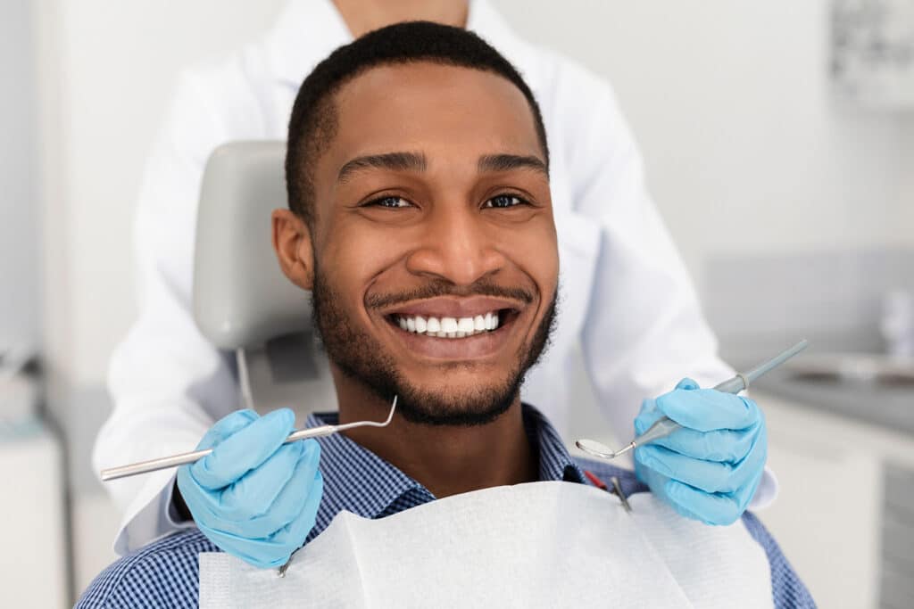 man.smiling.dental