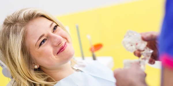 woman smiling at dentist